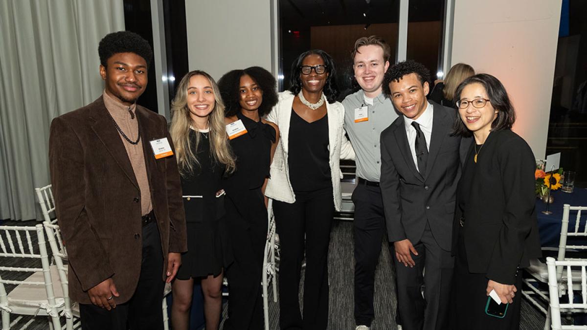 Group of Pace University students smiling at the camera at the Seidenberg Innovation Awards event.