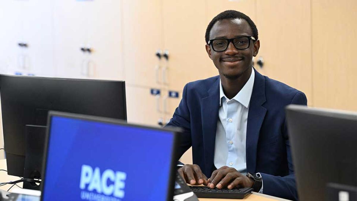 Elisabeth Haub School of Law at Pace University LLM student on a computer