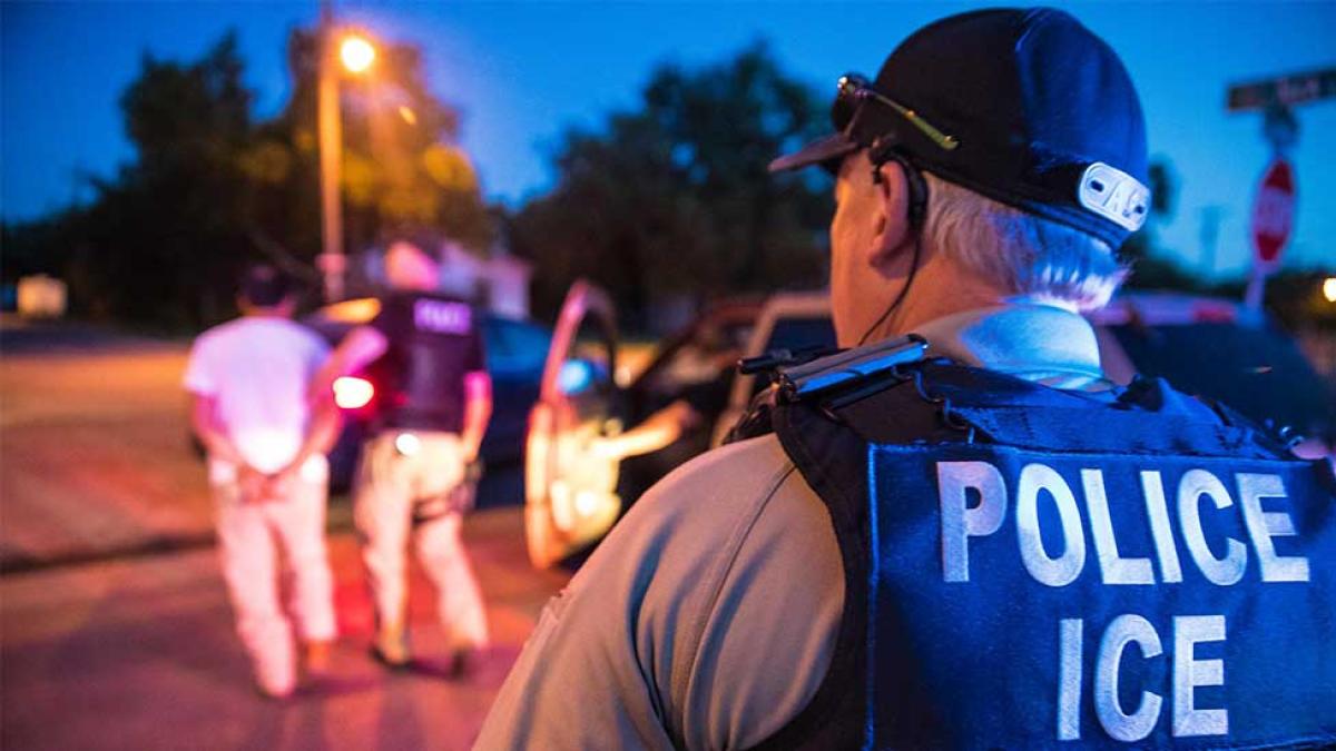 Ice agents overseeing a protest