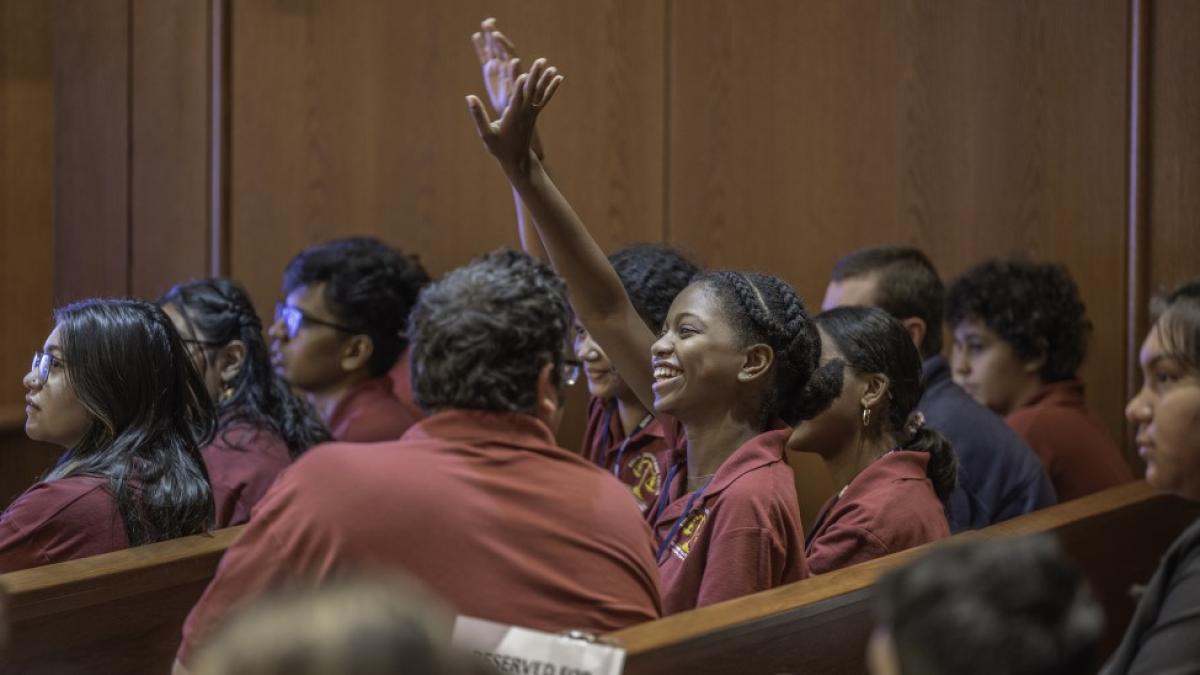 Elisabeth Haub School of Law at Pace University student in pipeline program raising hand