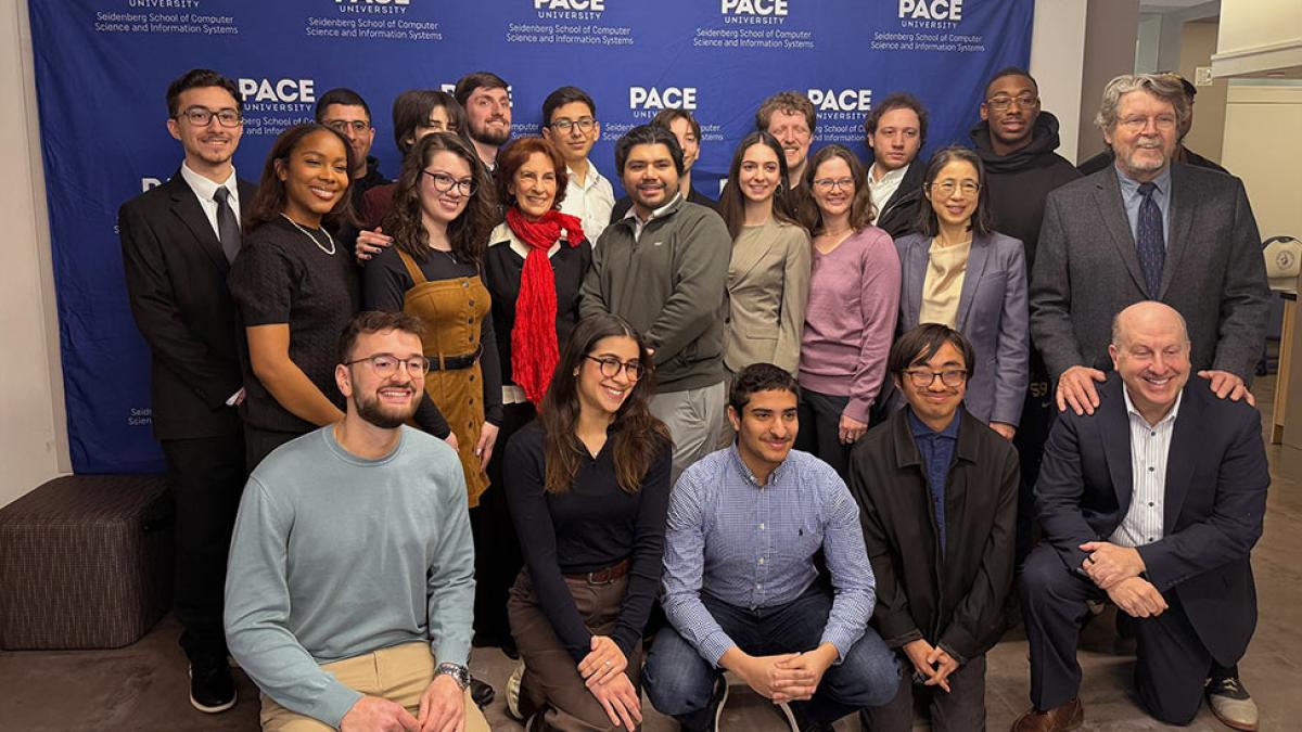 ace University President Marvin Krislov; Li-Chiou Chen, PhD, interim dean of the Seidenberg School of Computer Science and Information Systems; Gale Epstein; and Executive Director John Cronin with current and former students of the Center.