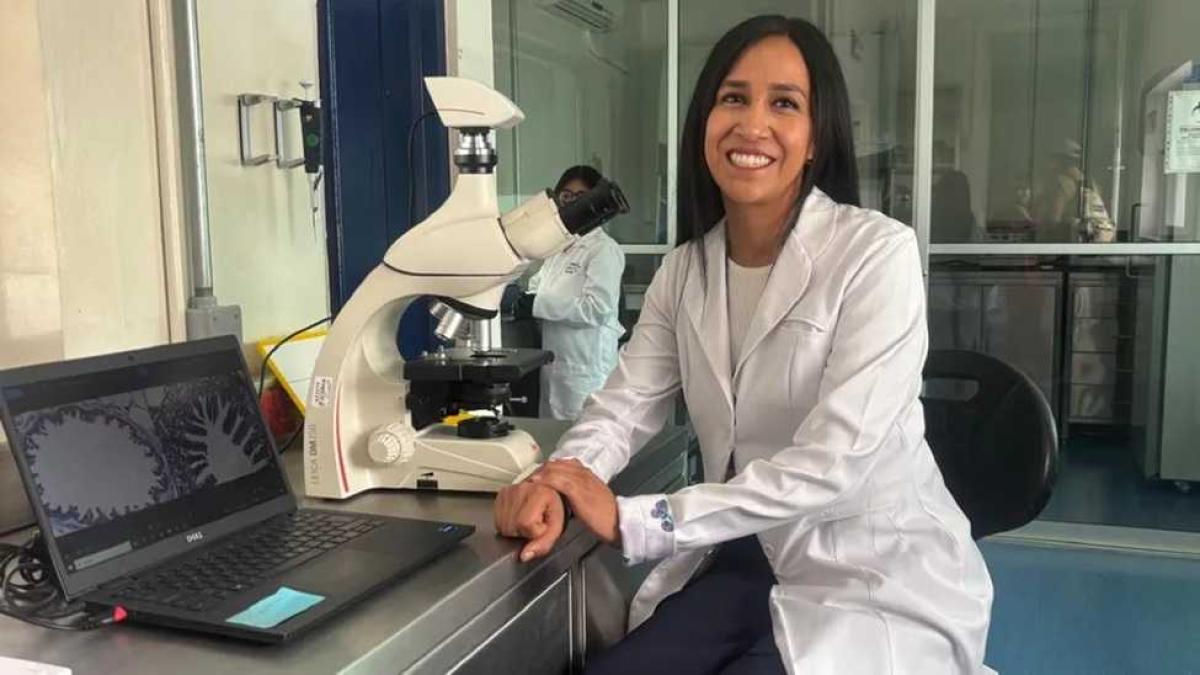 lab doctor next to microscope