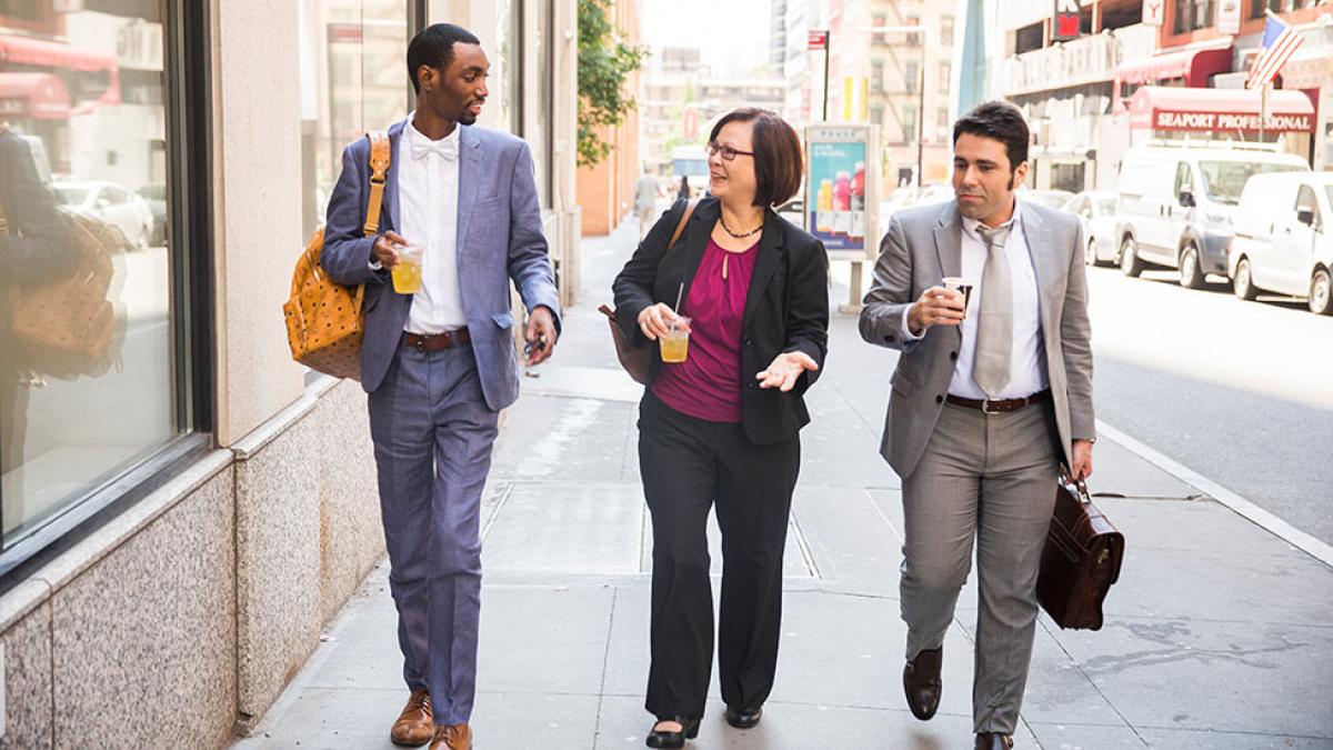 Lubin graduate students walking in Lower Manhattan near the New York City Campus