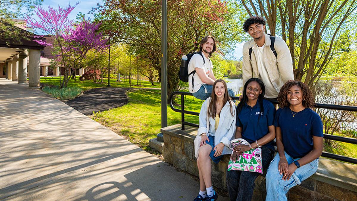 A group of Pace University students pose on the Pleasantville Campus