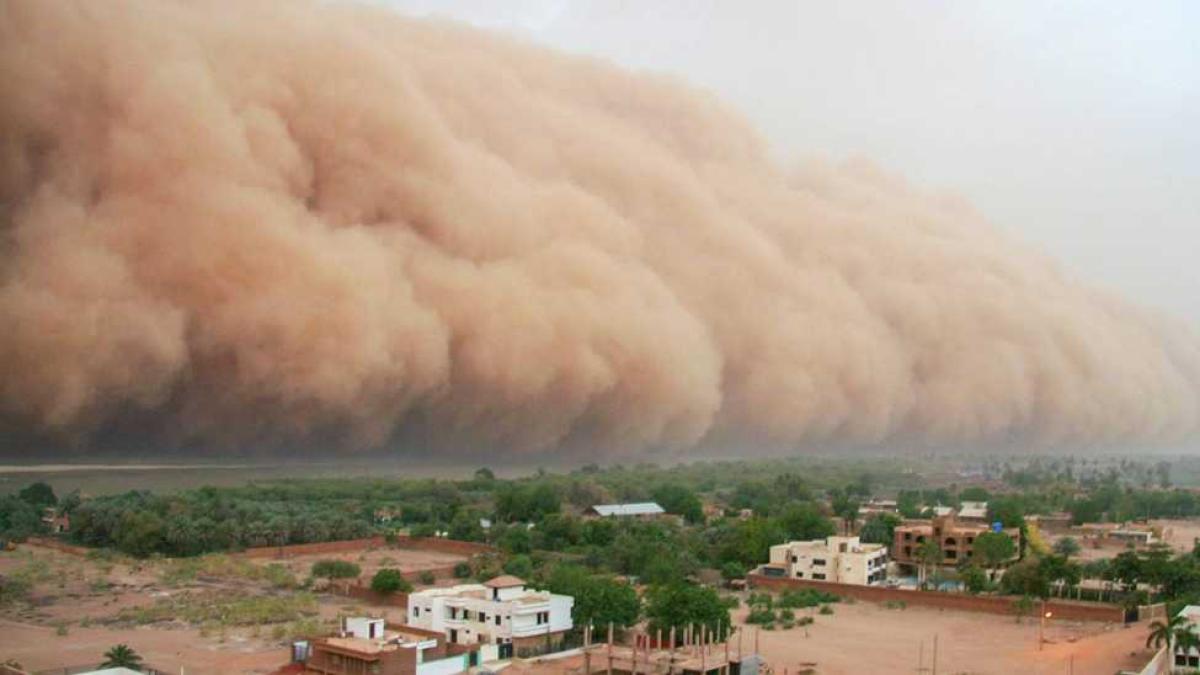 Big cloud of dust over a rural village