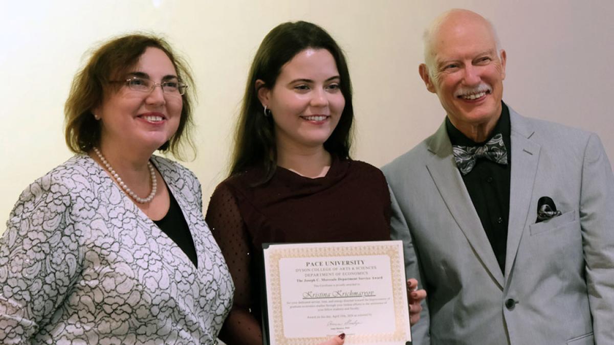 Pace University's Joseph Morreale Economics fund recipient posing with faculty