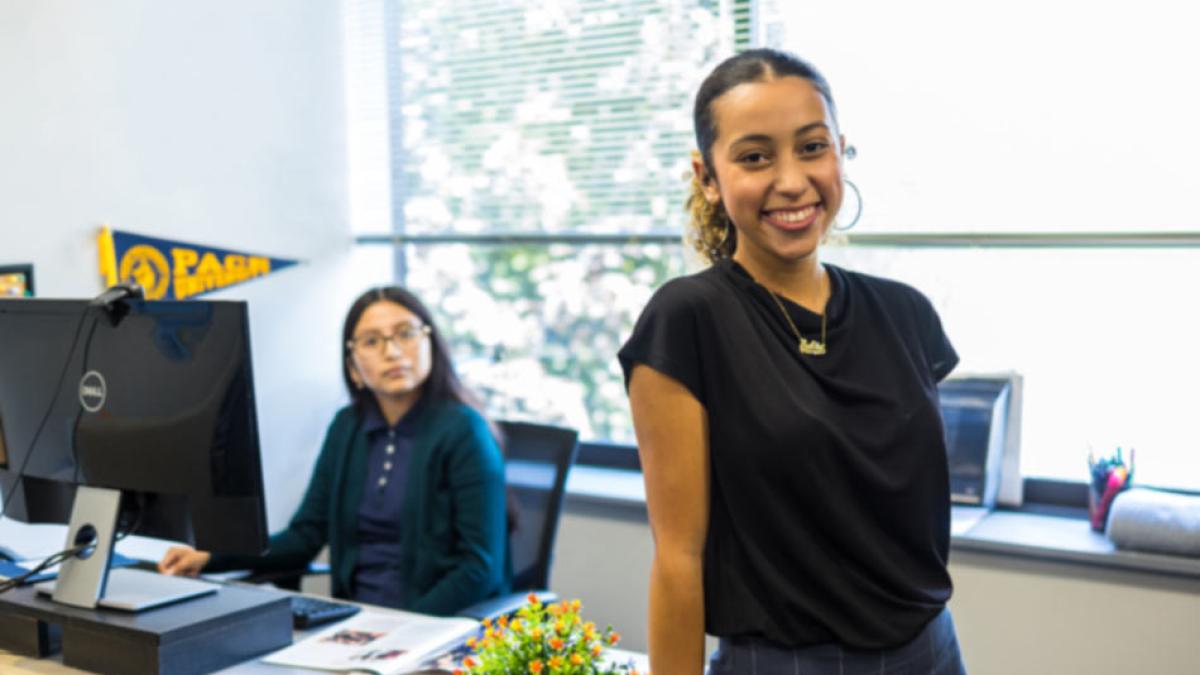 two students in an office at Pace University
