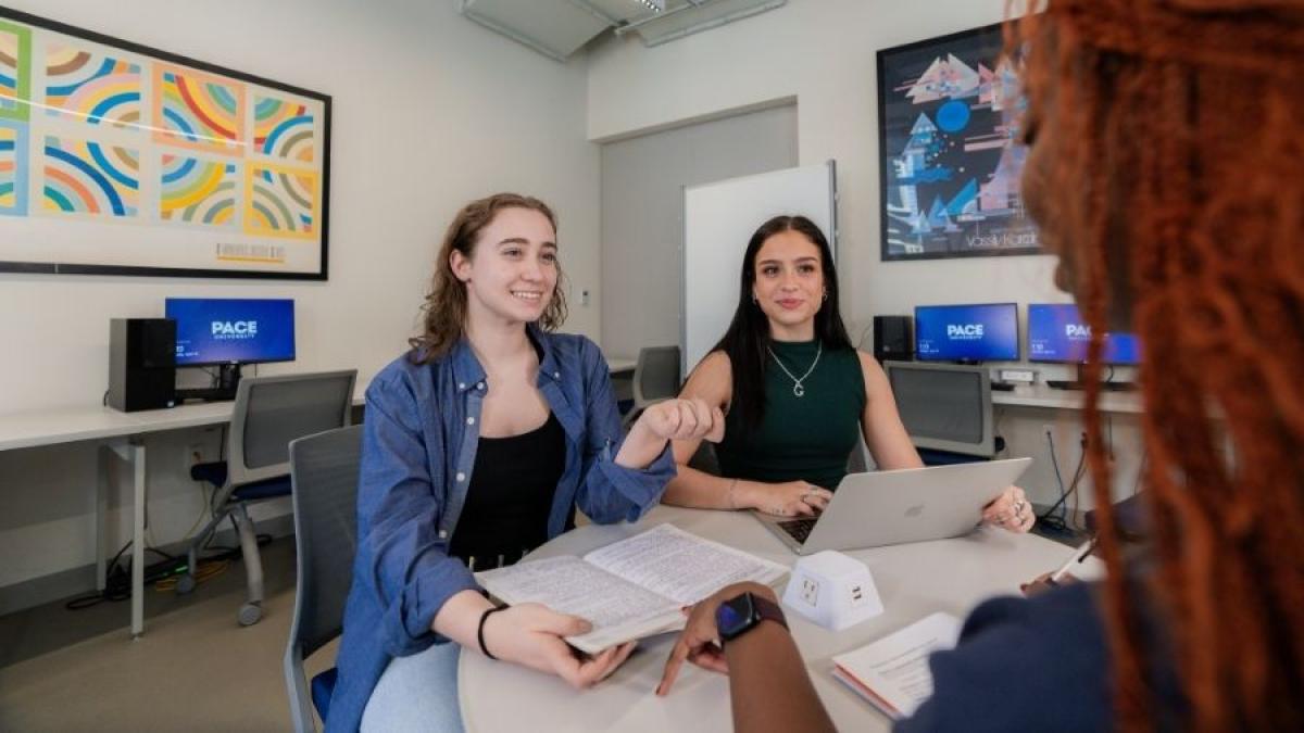 Mentor helping students