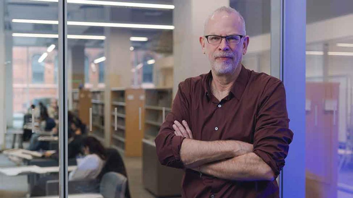 Pace University professor James Brusseau crosses his arms