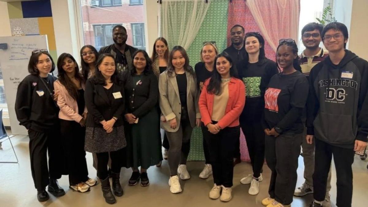 Break the Pattern with AI event participants posing for a group photo