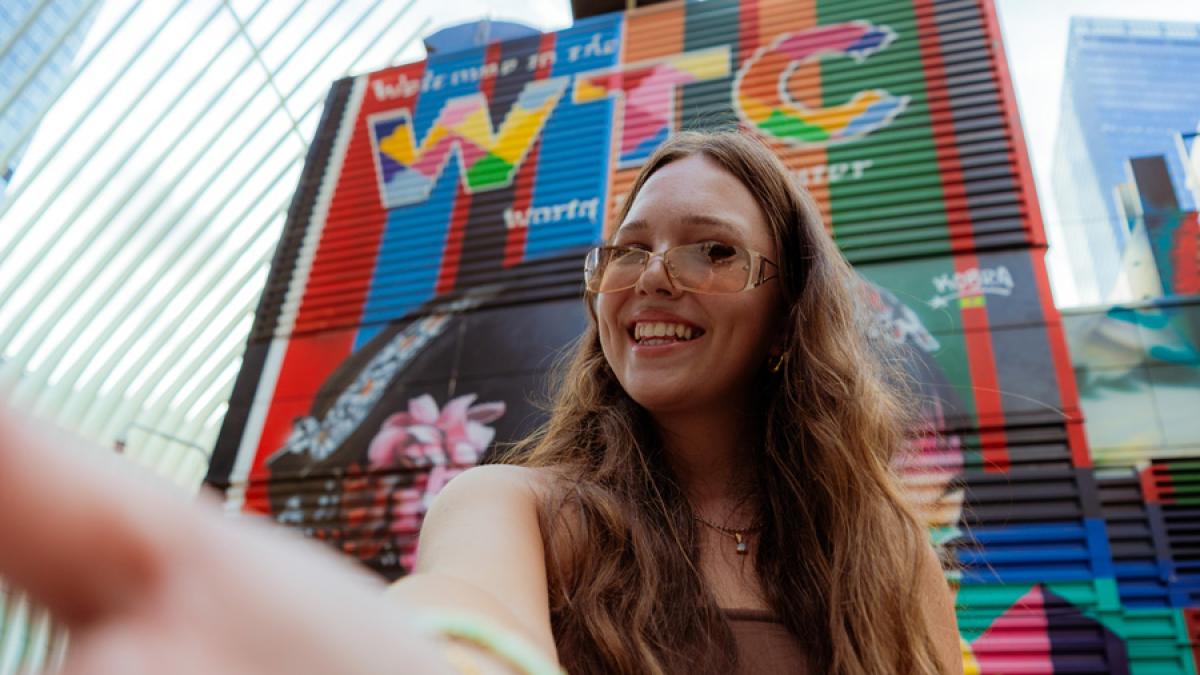 Pace University student taking a selfie in NYC.