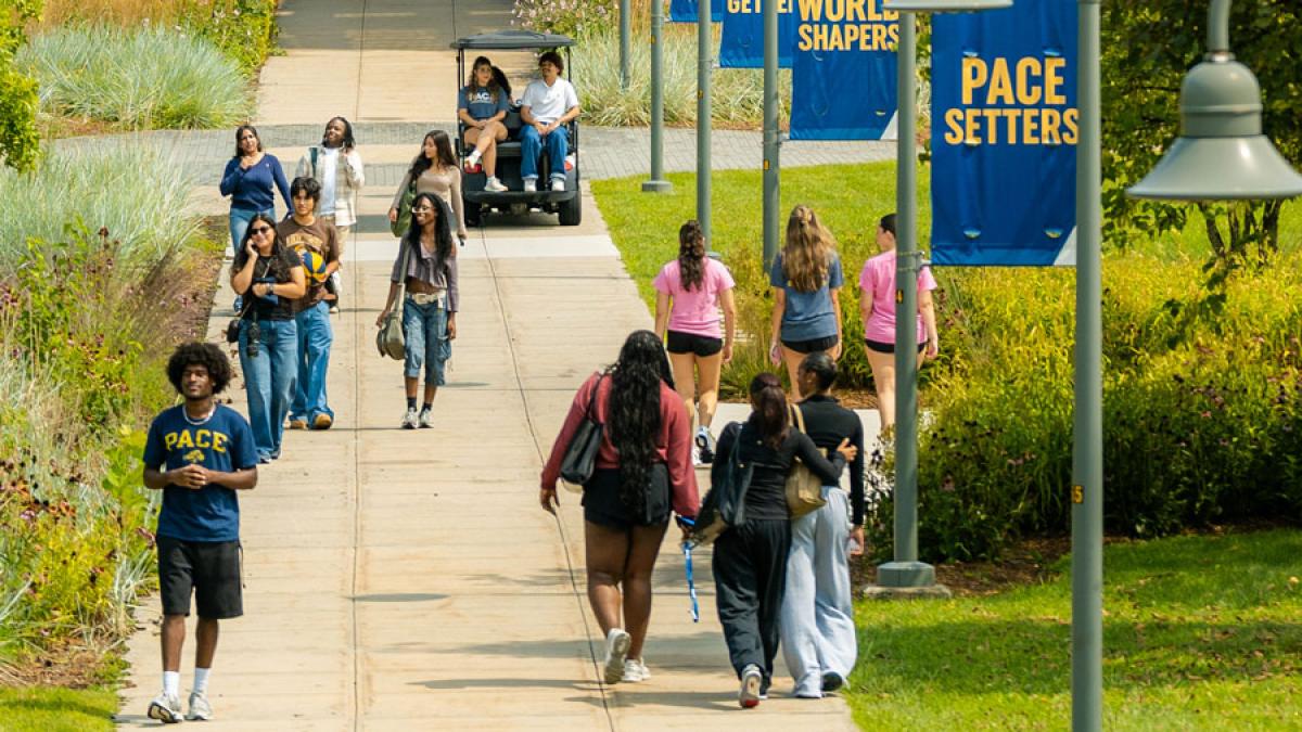 Pace University students walking around the Westchester campus.