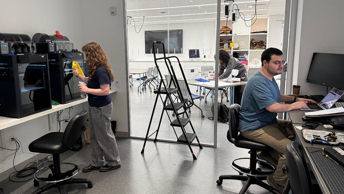 Student collaborating in makerspace