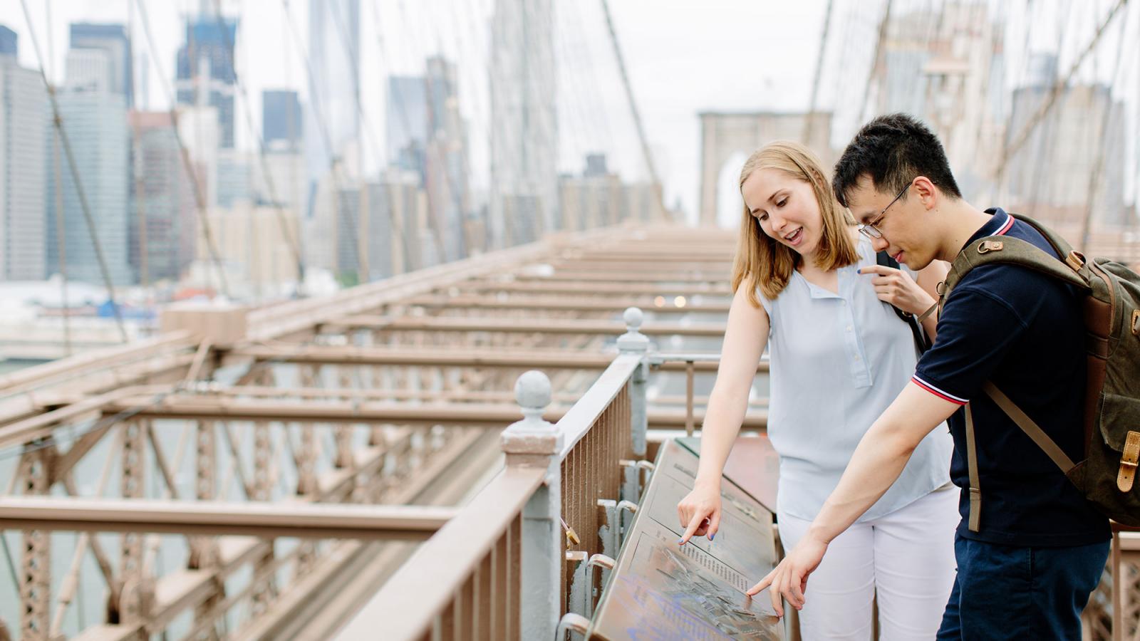 Students spending time on the Brooklyn Bridge.