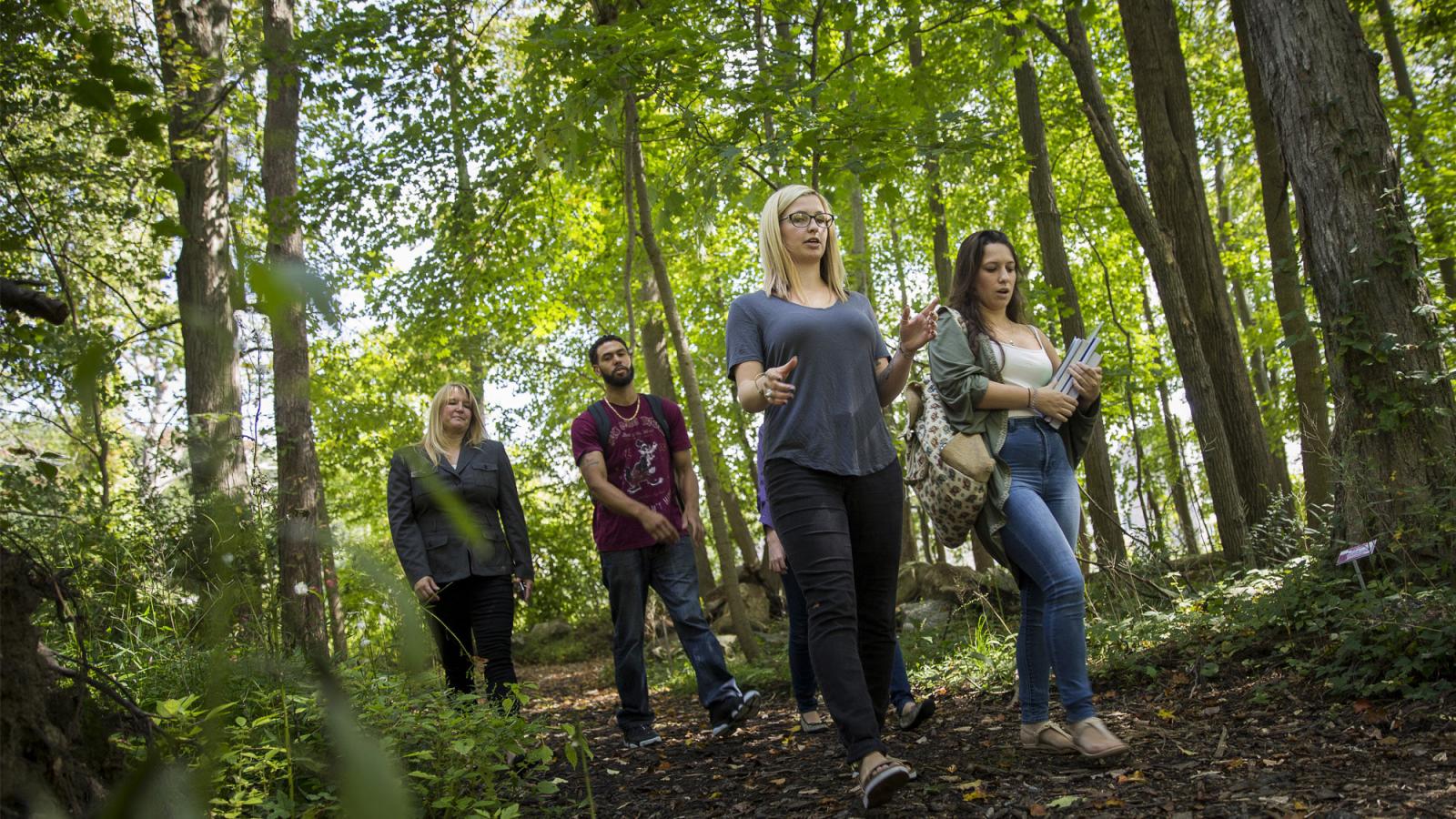 Students and faculty walking the nature trails on the Westchester campus.