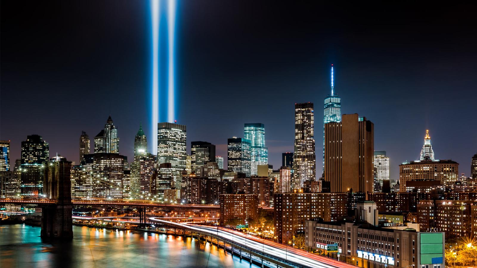 tribute in light over a dark manhattan skyline