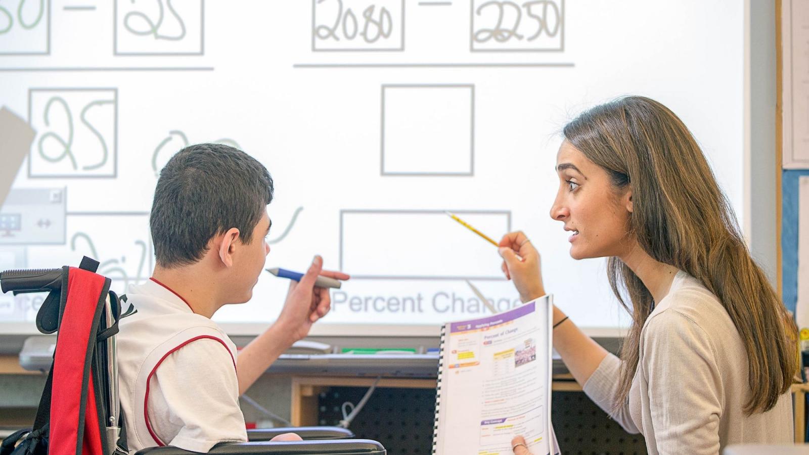 Teacher with Special Education Student in Wheelchair