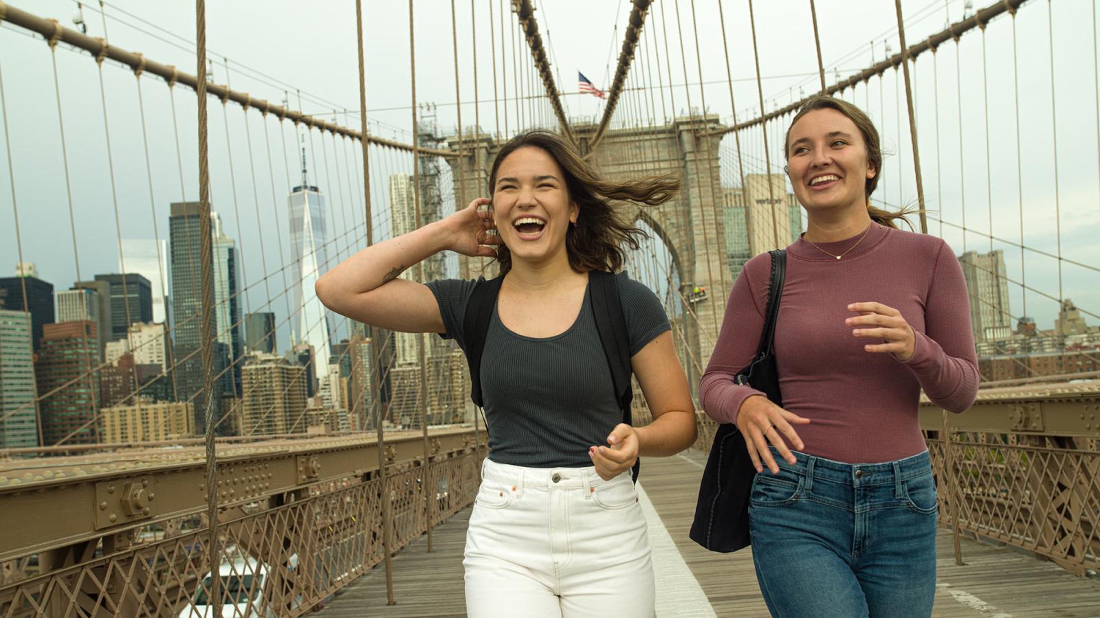 Students walking on the Brooklyn Bridge.