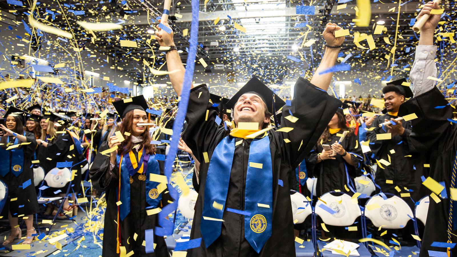 Students celebrating their graduation.