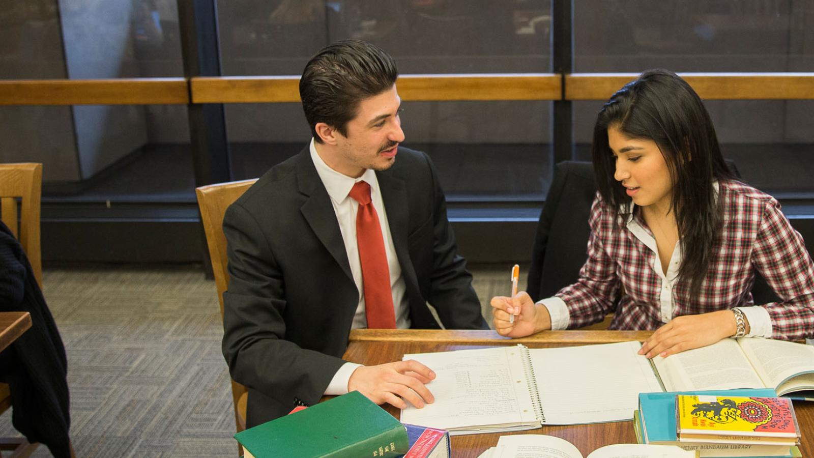 two Lubin students studying in the Student Center of One Pace Plaza in lower Manhattan