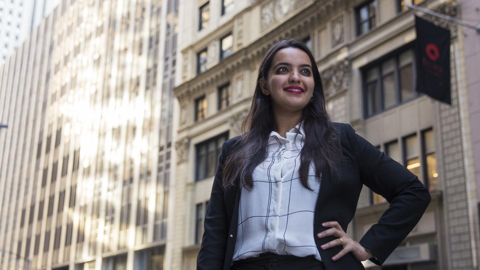 Pace student standing on the street in Lower Manhattan near One Pace Plaza