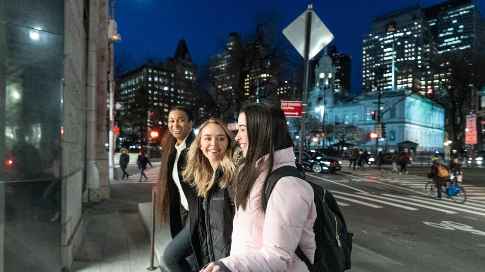 female students walking into 41 park row