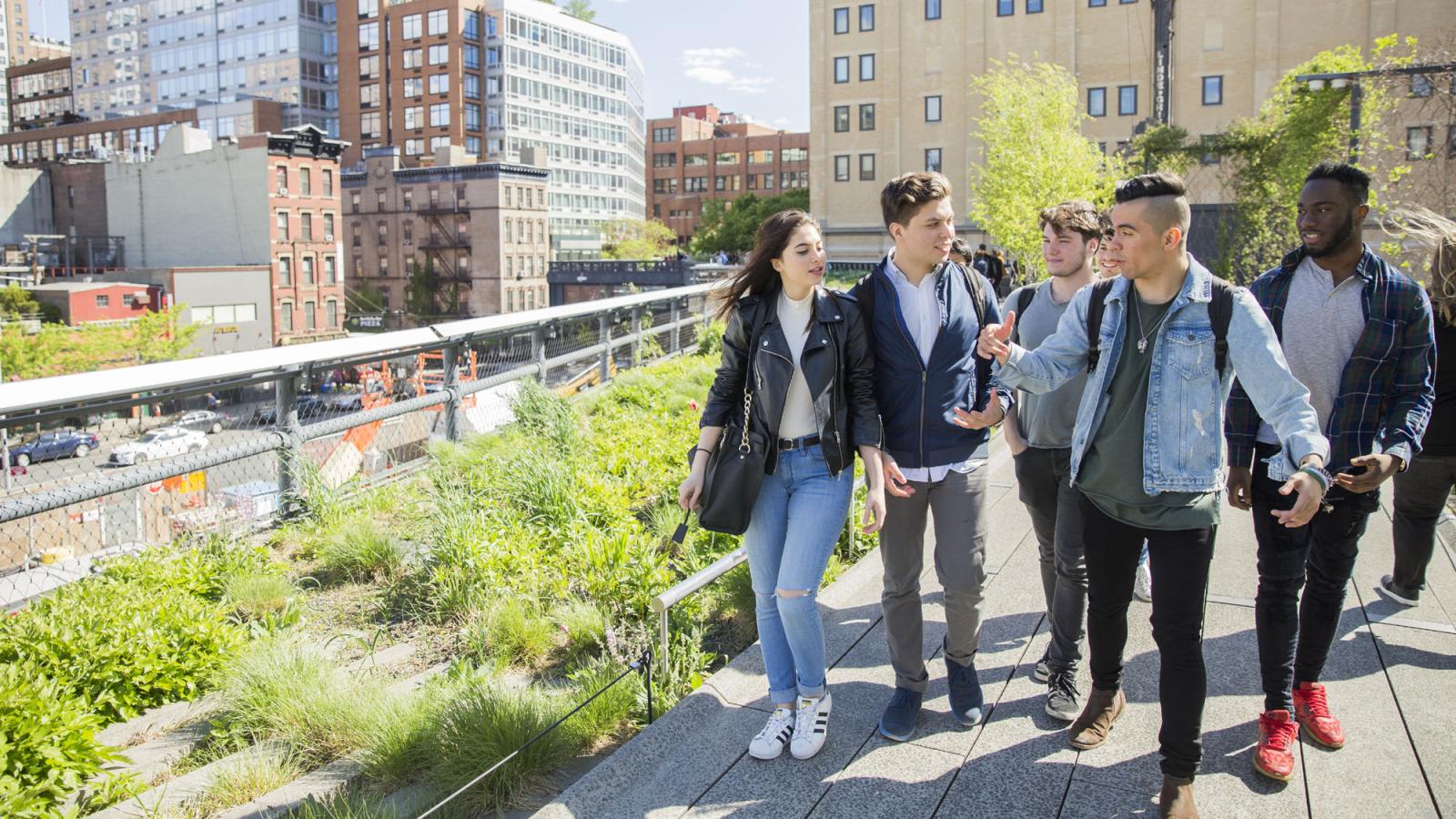 four Pace students walking on the High Line in Manhattan