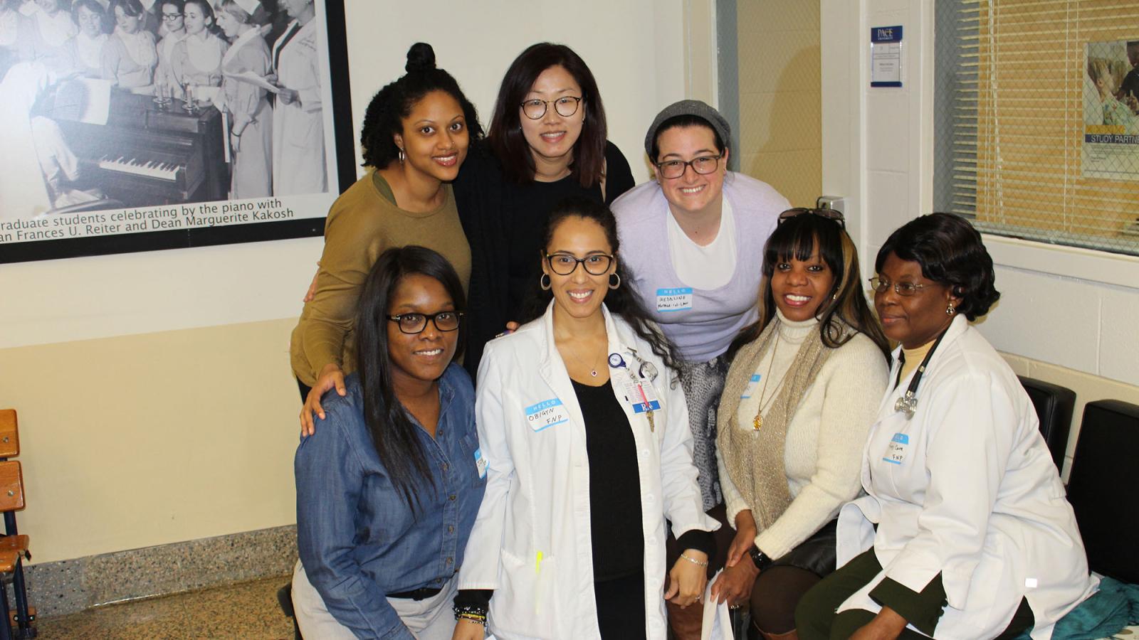 Group of DNP students smiling at the camera.