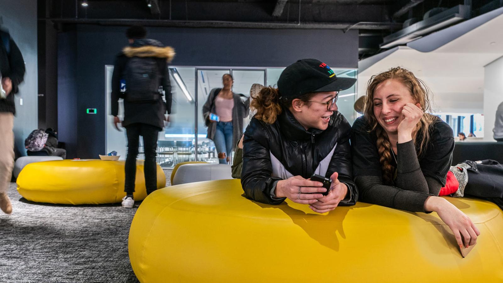 Students studying at 1 Pace Plaza in NYC.