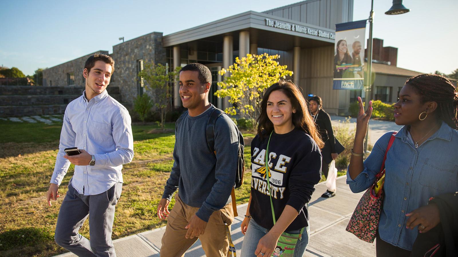 Students walking in front of the Kessel Student Center on the Westchester campus.