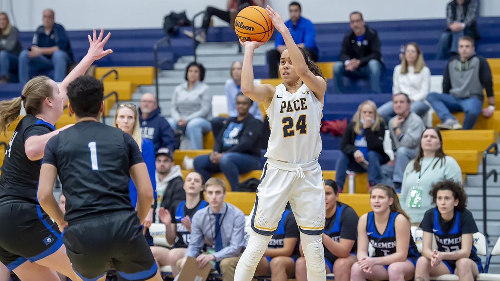 Pace women's basketball player Naya Rivera shooting over a defender