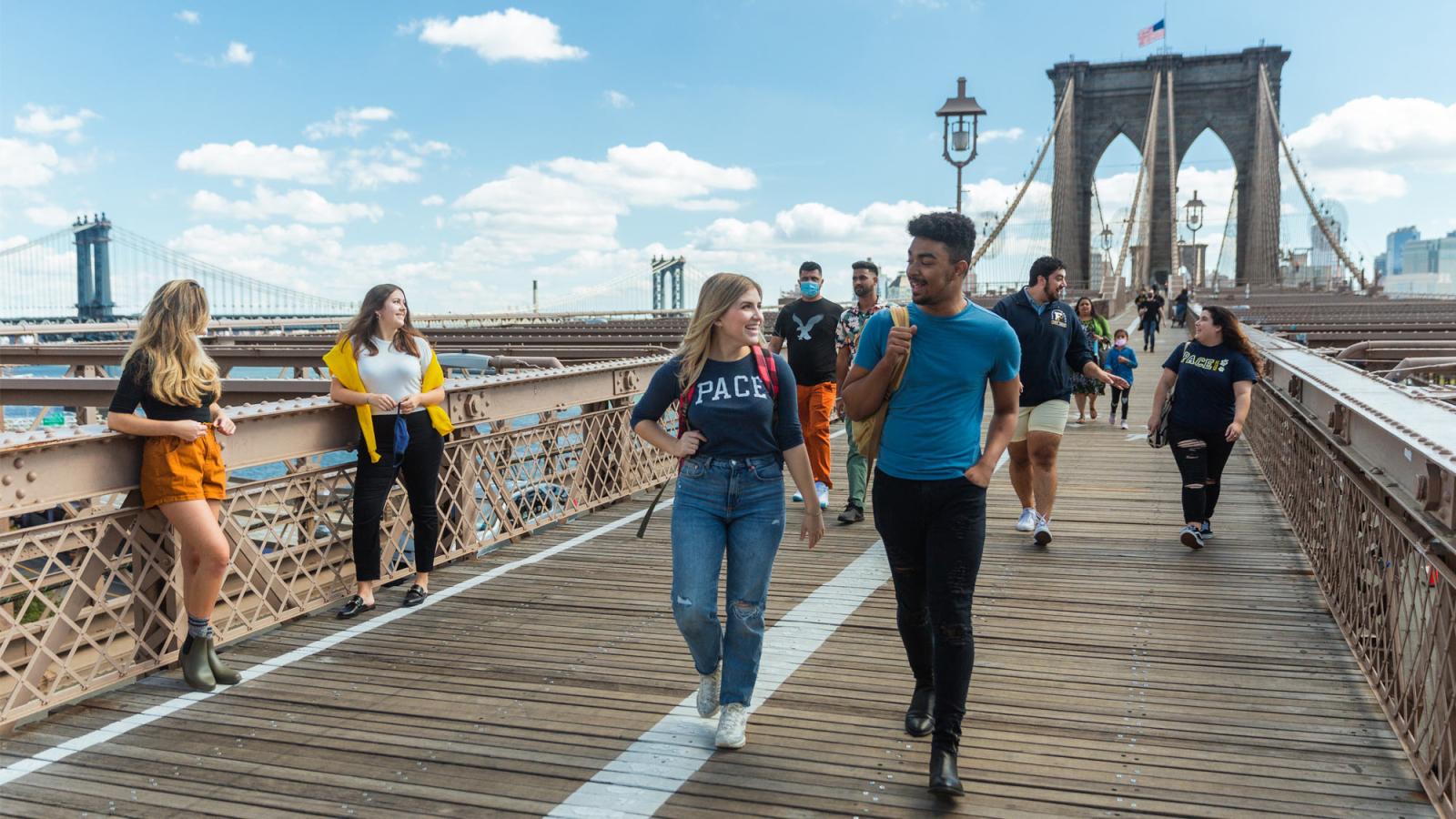 group of people on the brooklyn bridge