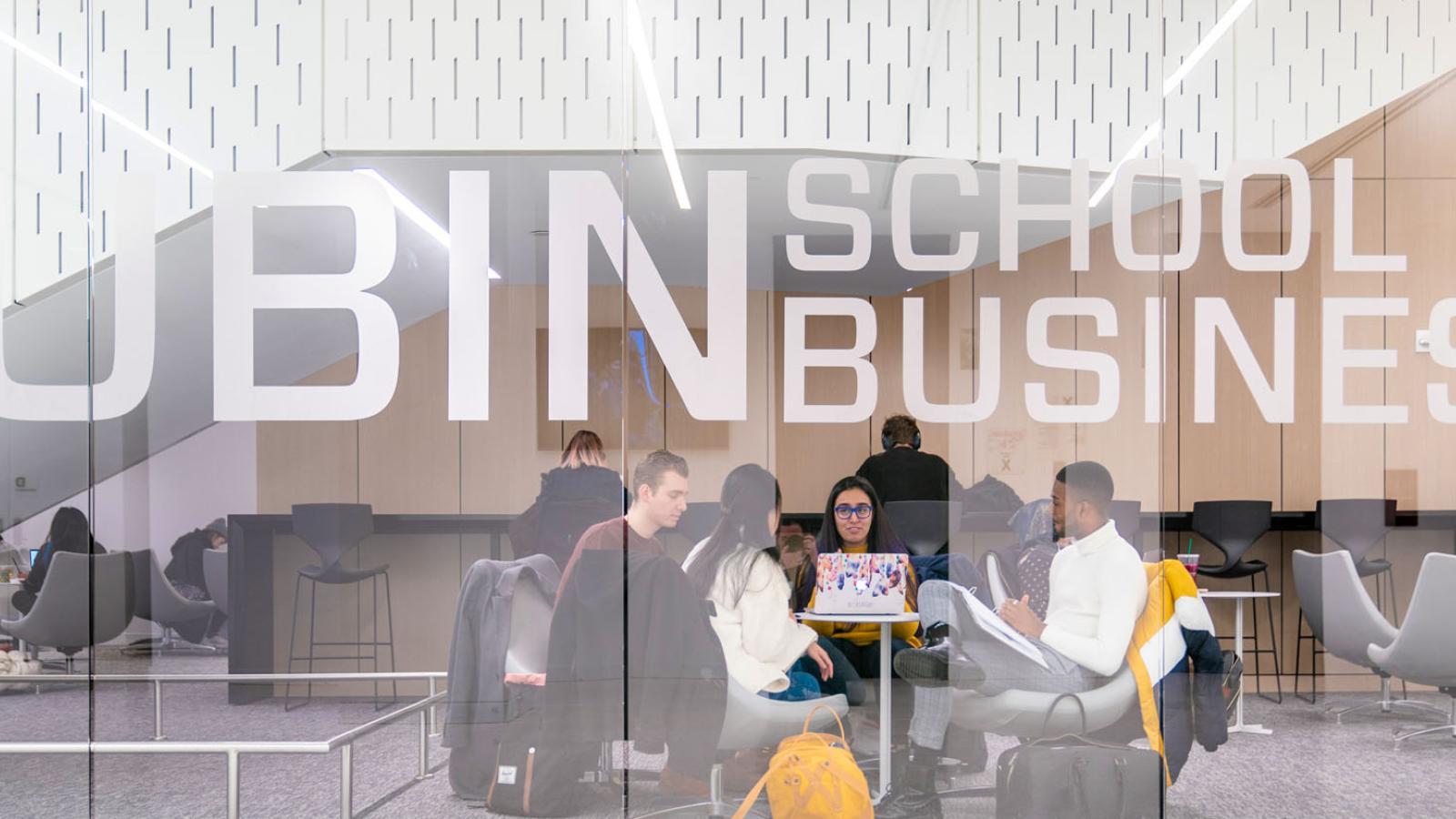 Lubin students sitting in a study lounge at One Pace Plaza