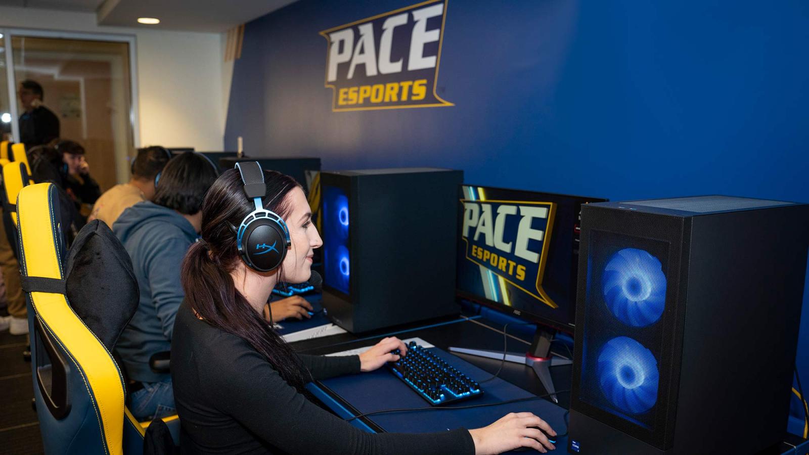 Pace student playing a video game at the university eSports Arena