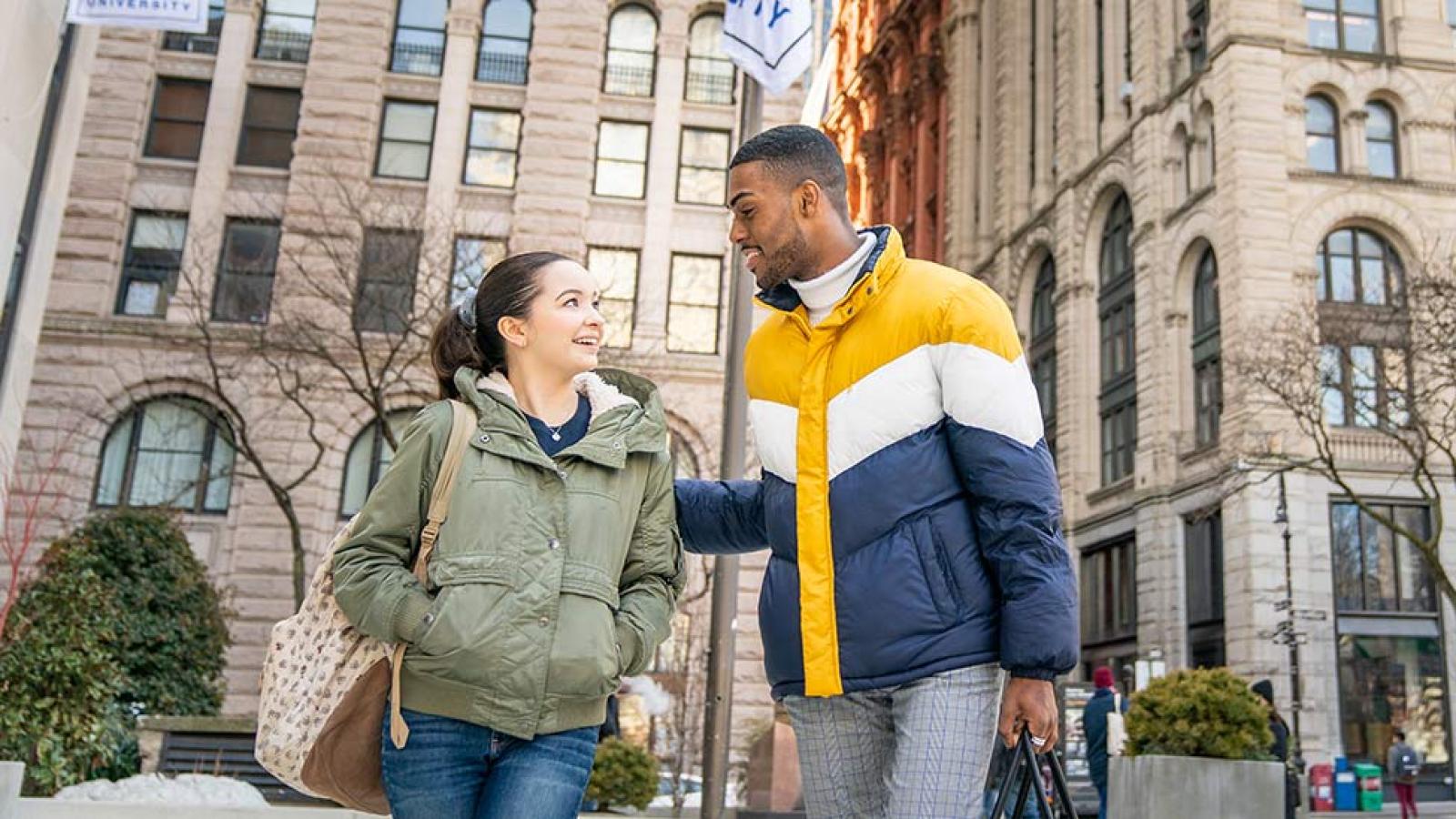 Two pace university students walking through Manhattan