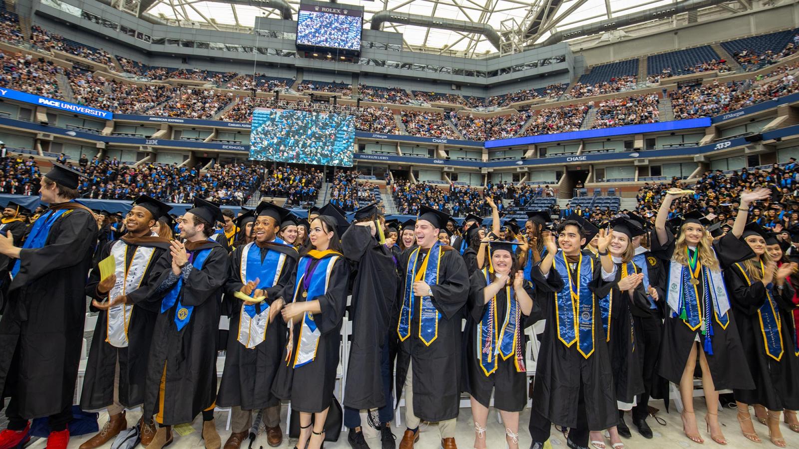 Students at Pace University Commencement in USTA Tennis Center