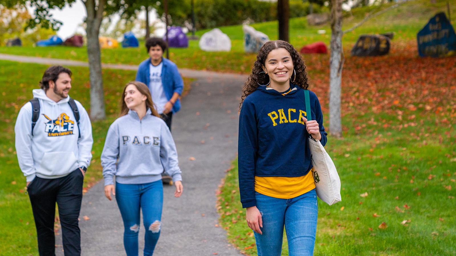 Group of Pace University students walking around the Pleasantville campus.