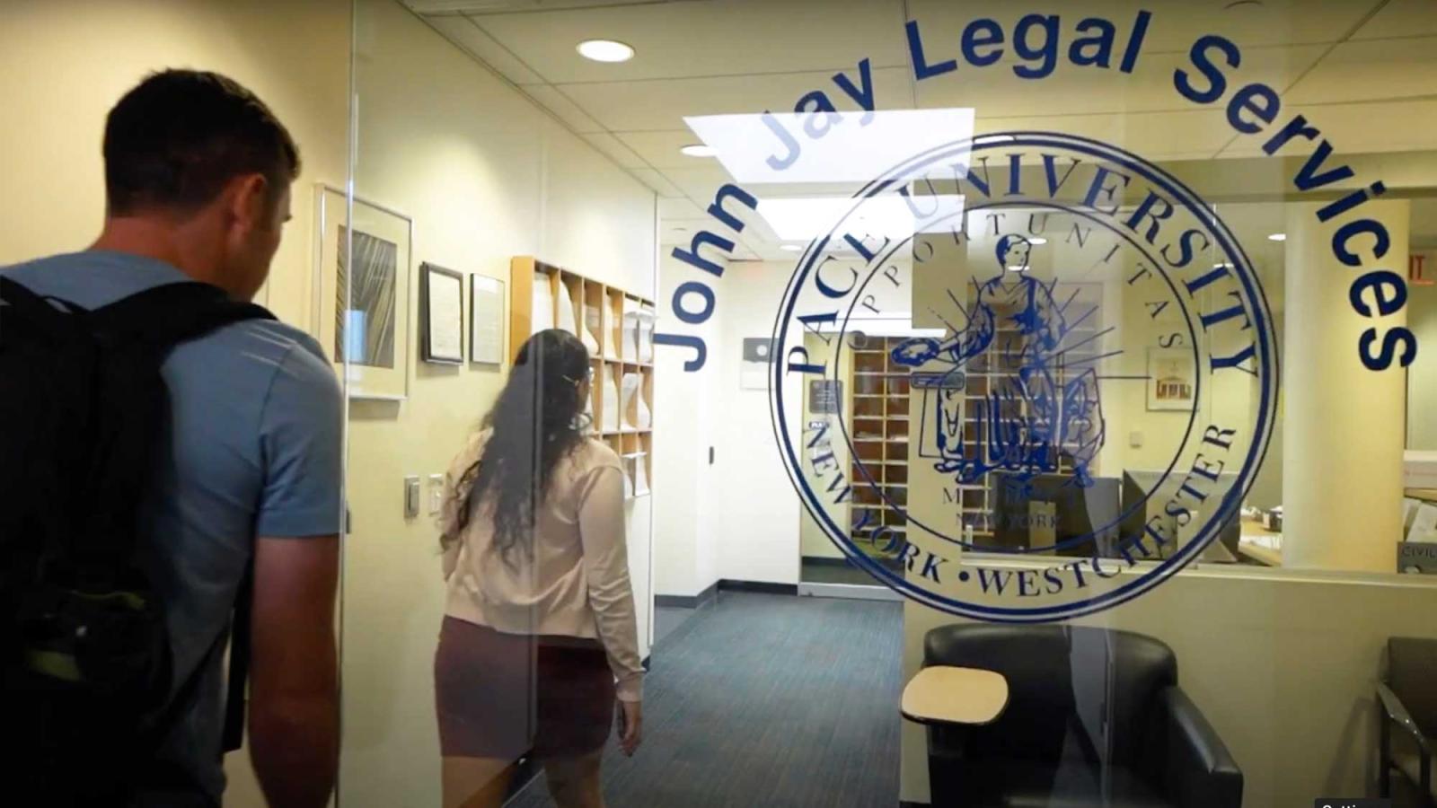 students walking into John Jay Legal Services Center on the Elisabeth Haub School of Law campus