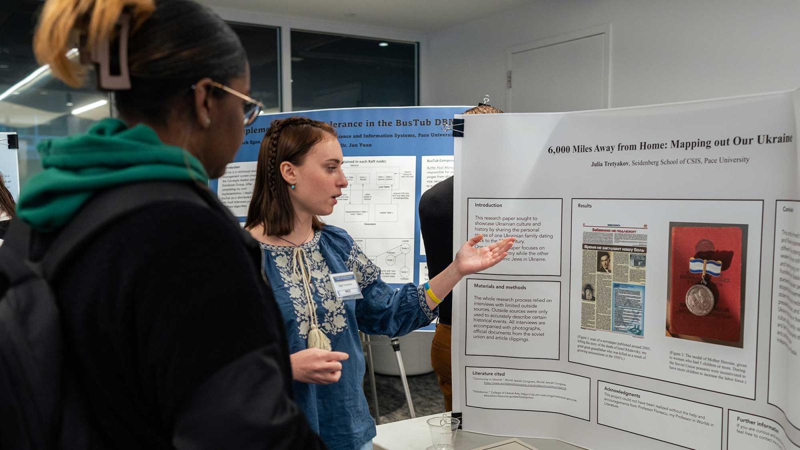 Undergraduate student presenting her research at Pace student faculty research day