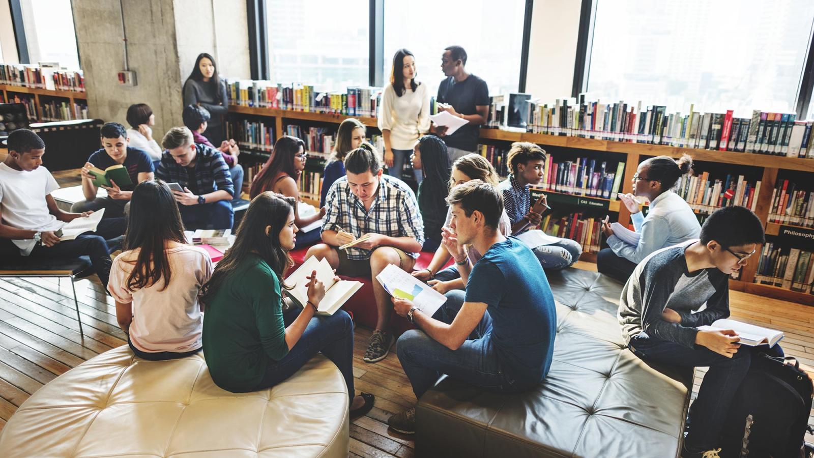 Students collaborating in a library space