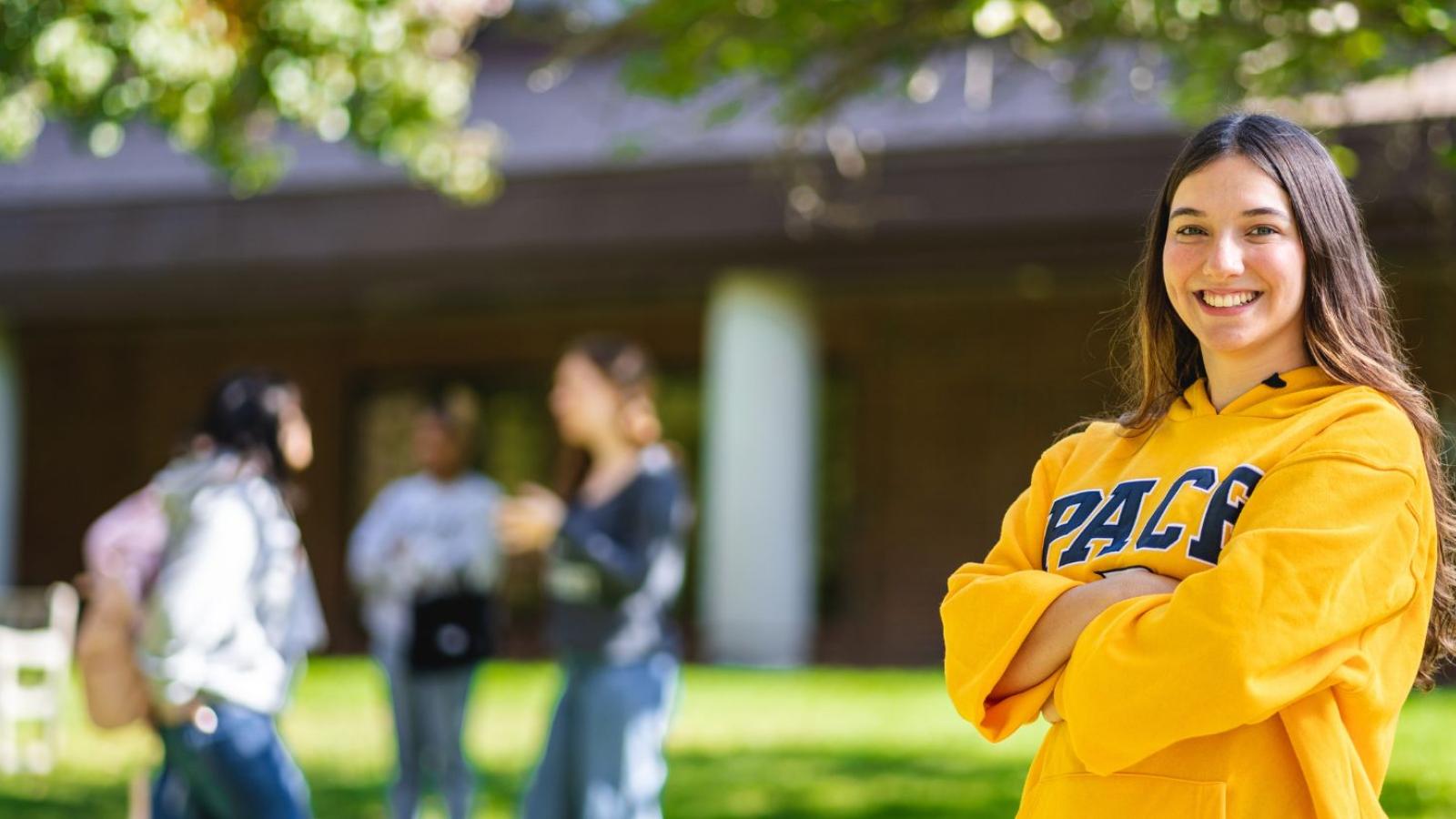 girl smiling on college campus