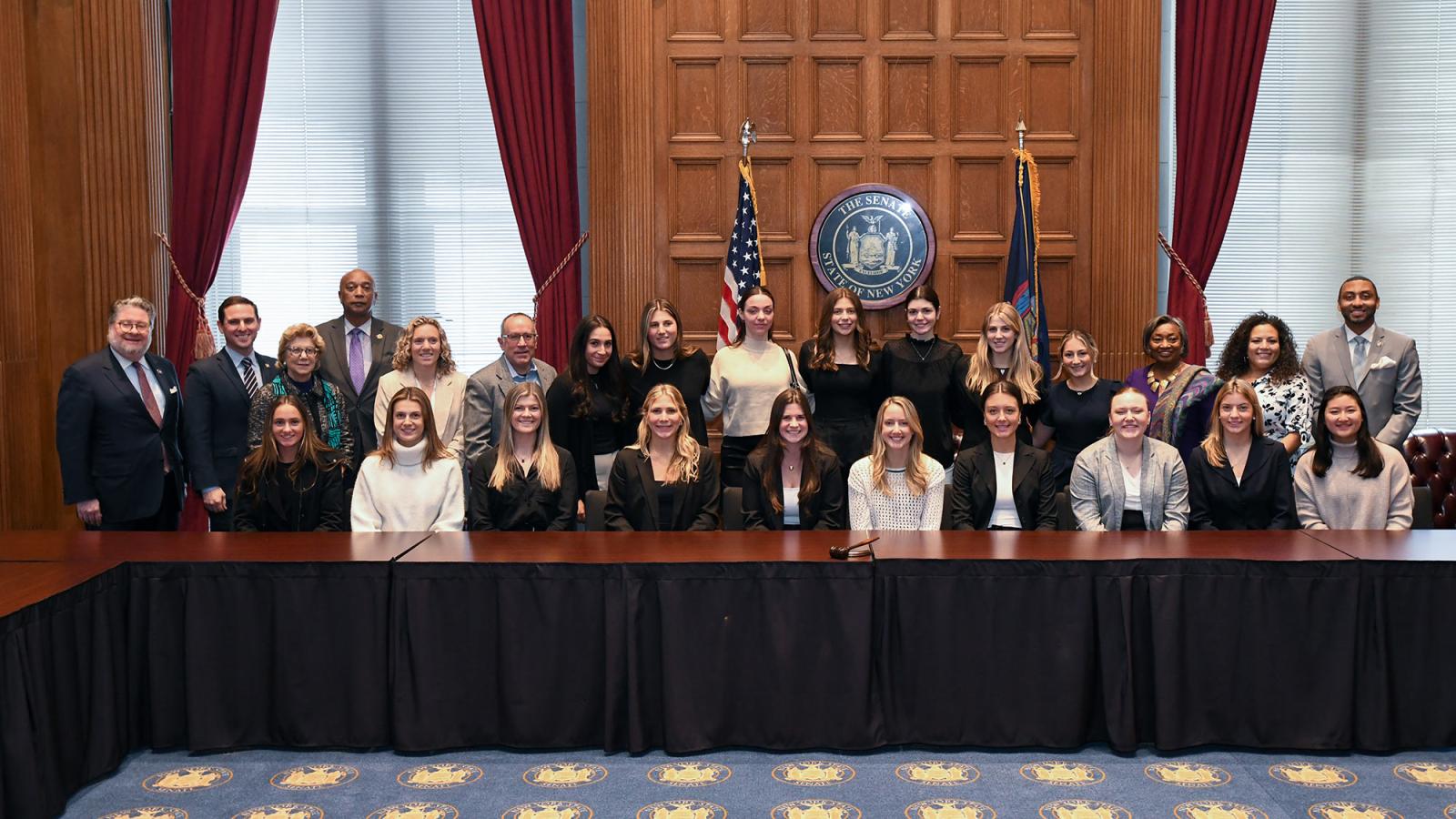 Members of the Pace University Women's Lacrosse team with the Westchester Delegation in Albany.