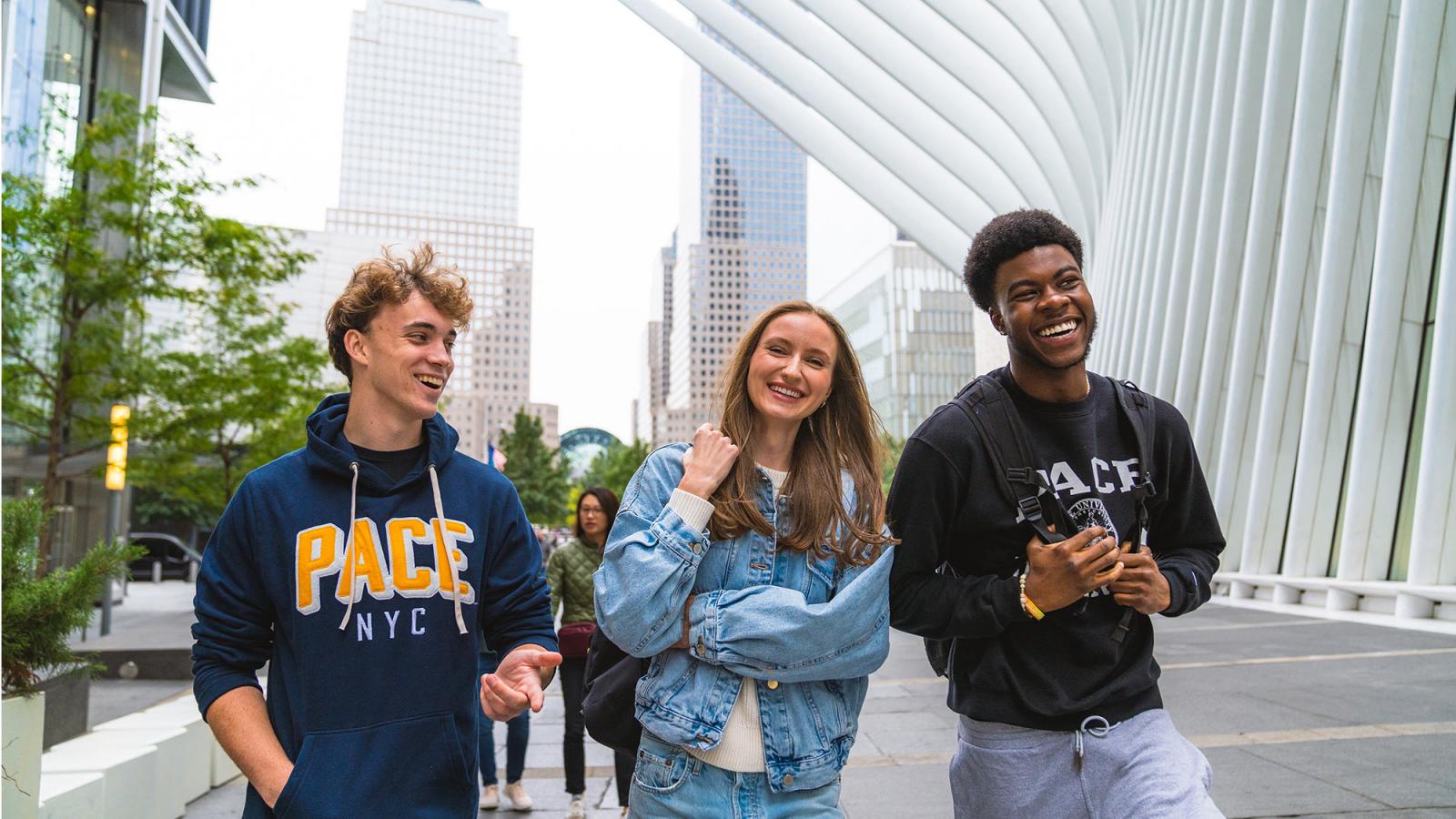 group of Pace University students walking and laughing