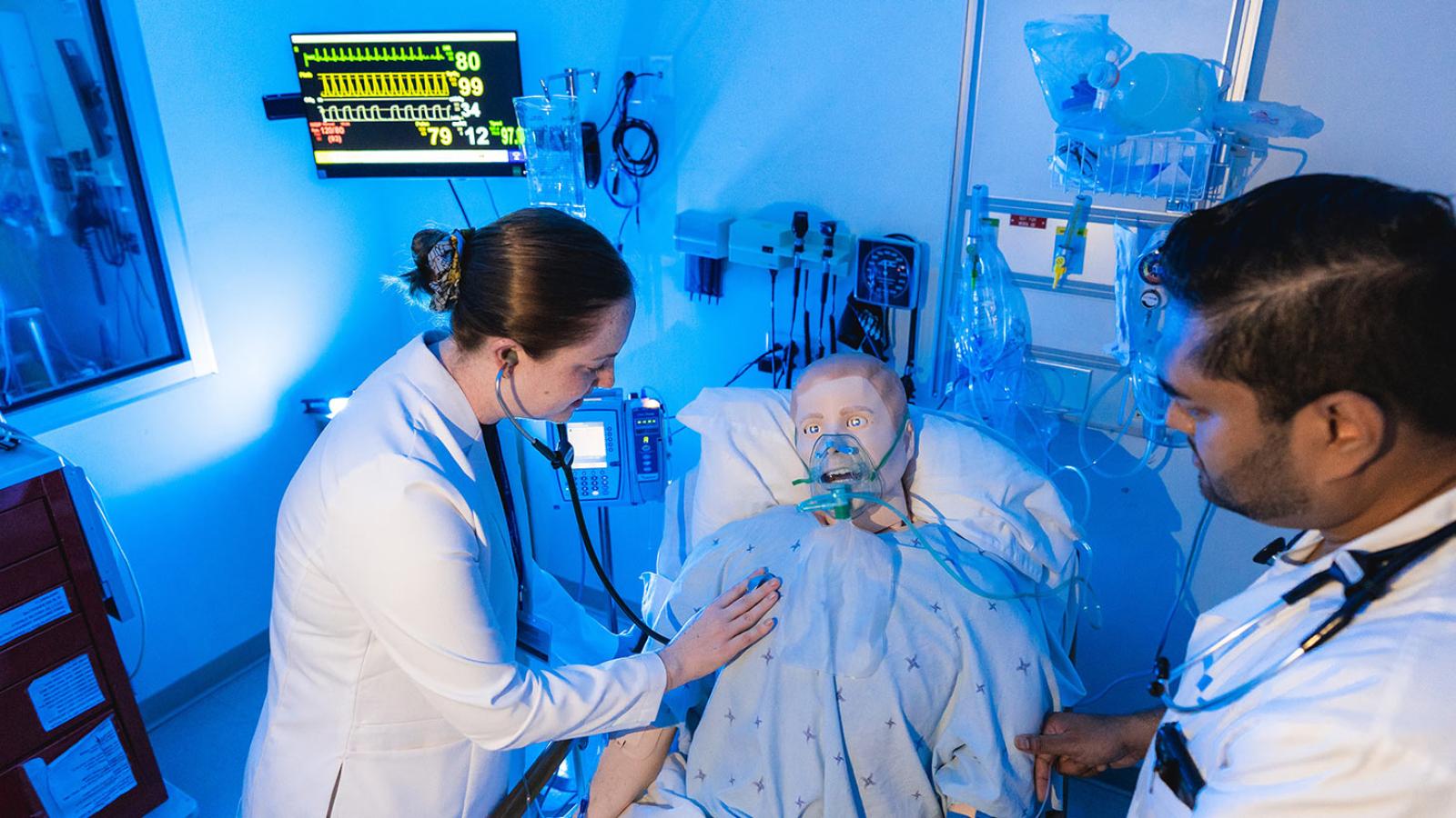 Nursing students working in the simulation lab