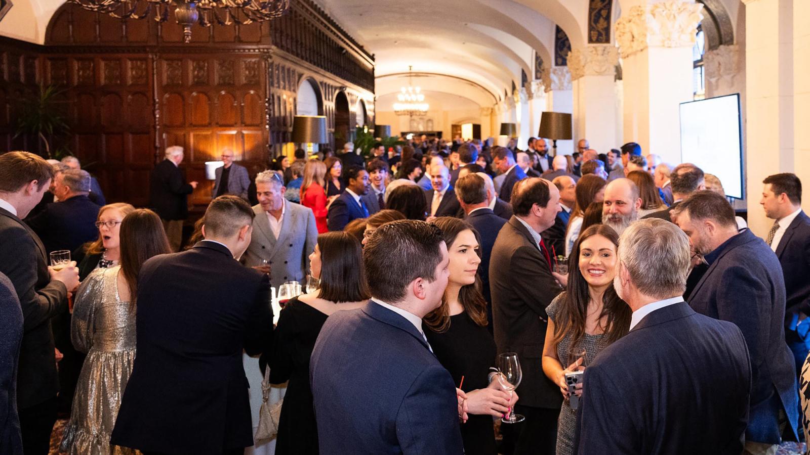 Haub Law alumni at a networking event