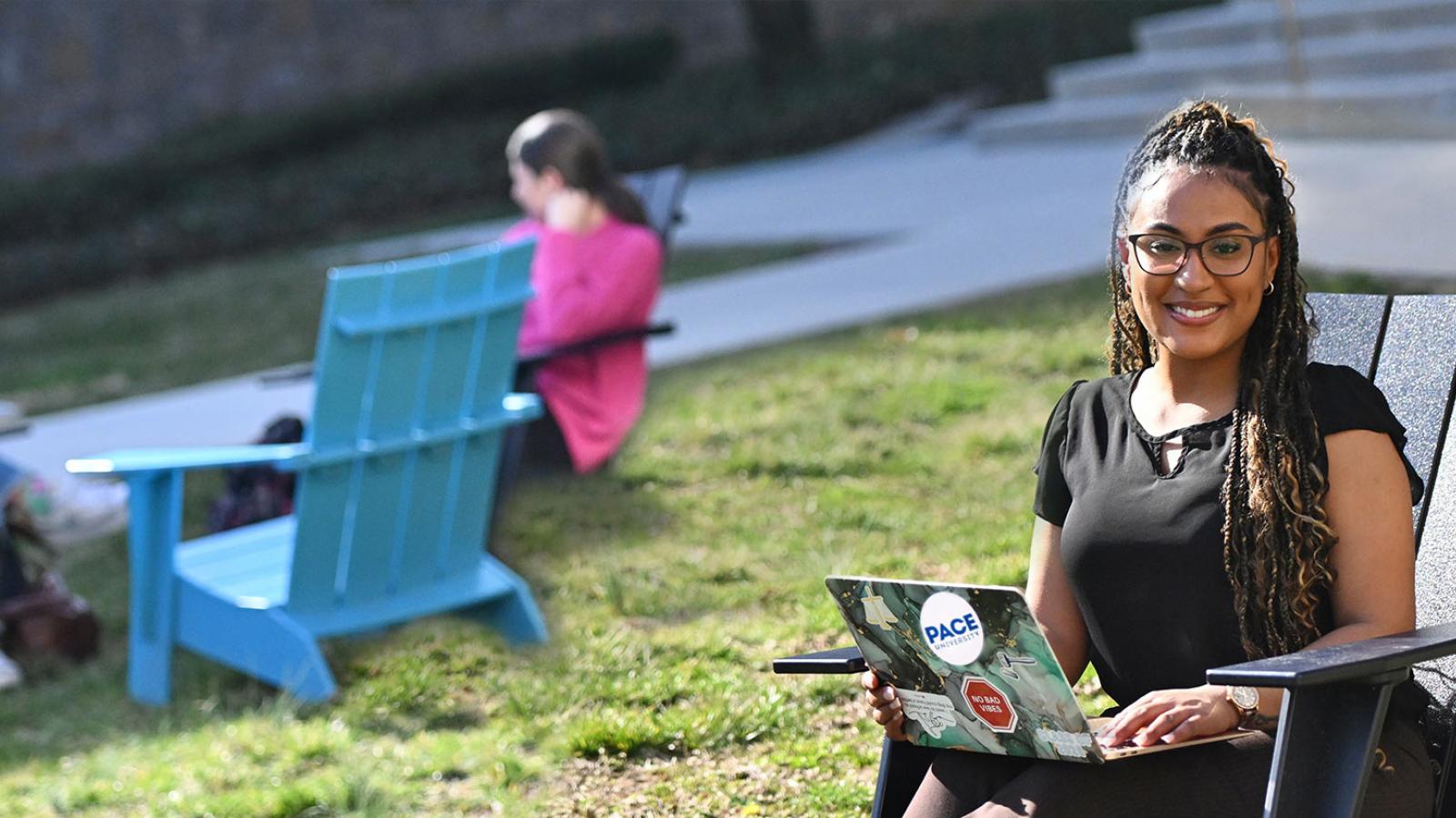 Haub law student studying outside