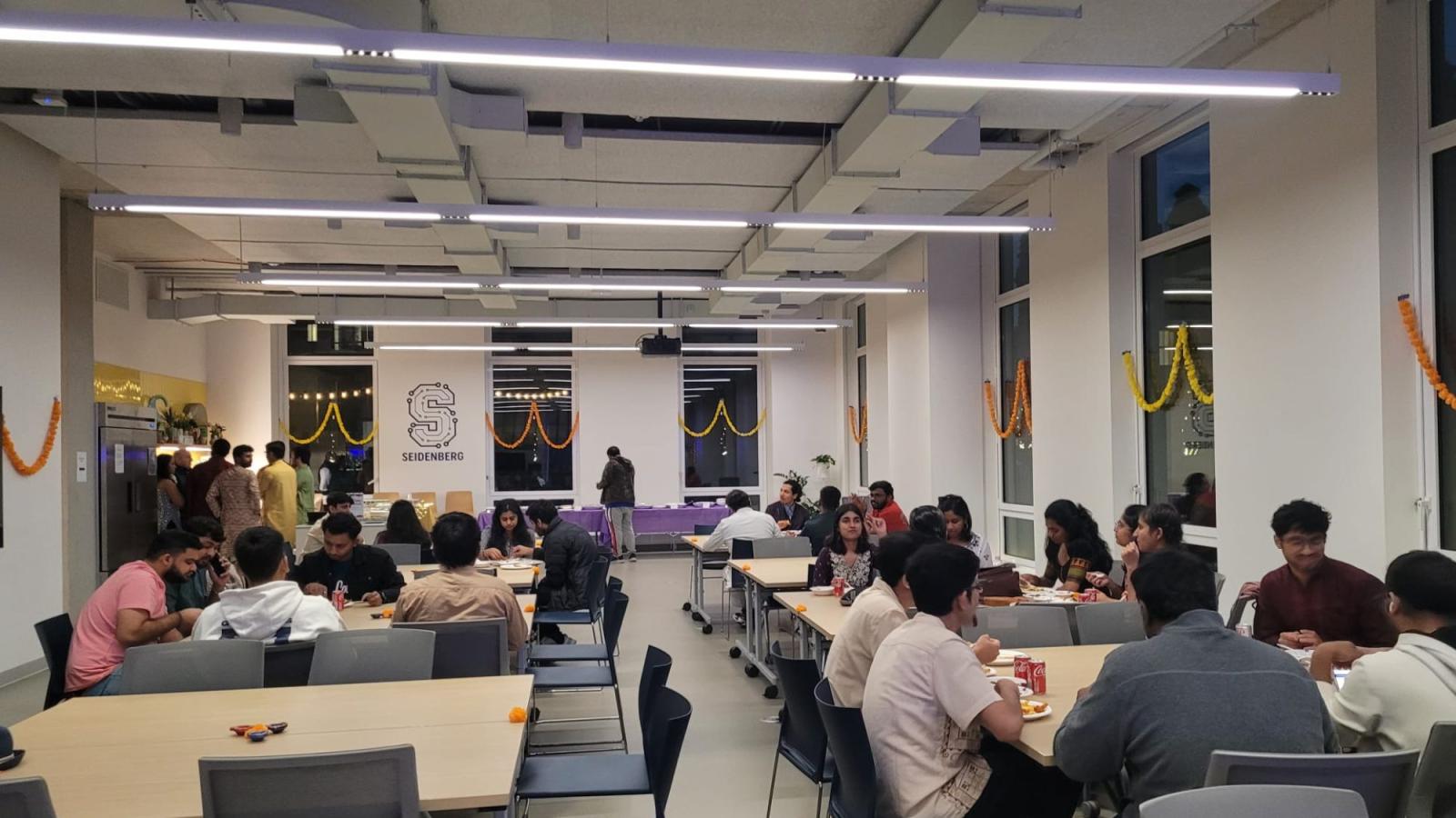 Seidenberg's Design Factory space full of students and decorations for Diwali.