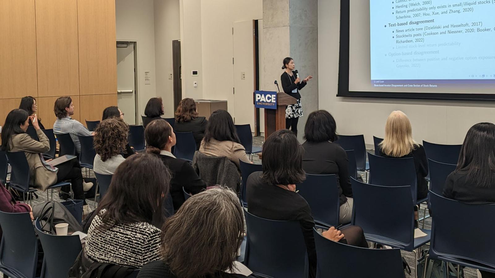 Professor Sophia Li of Rutgers University presents her research in the main session at the 2023 Friends of Women in Finance Symposium-Greater New York (FWFS-GNY) at Pace University