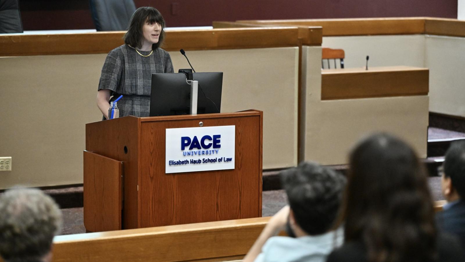 Elisabeth Haub School of Law at Pace University Professor Margot Pollans presenting the 2025 Hopkins Lecture