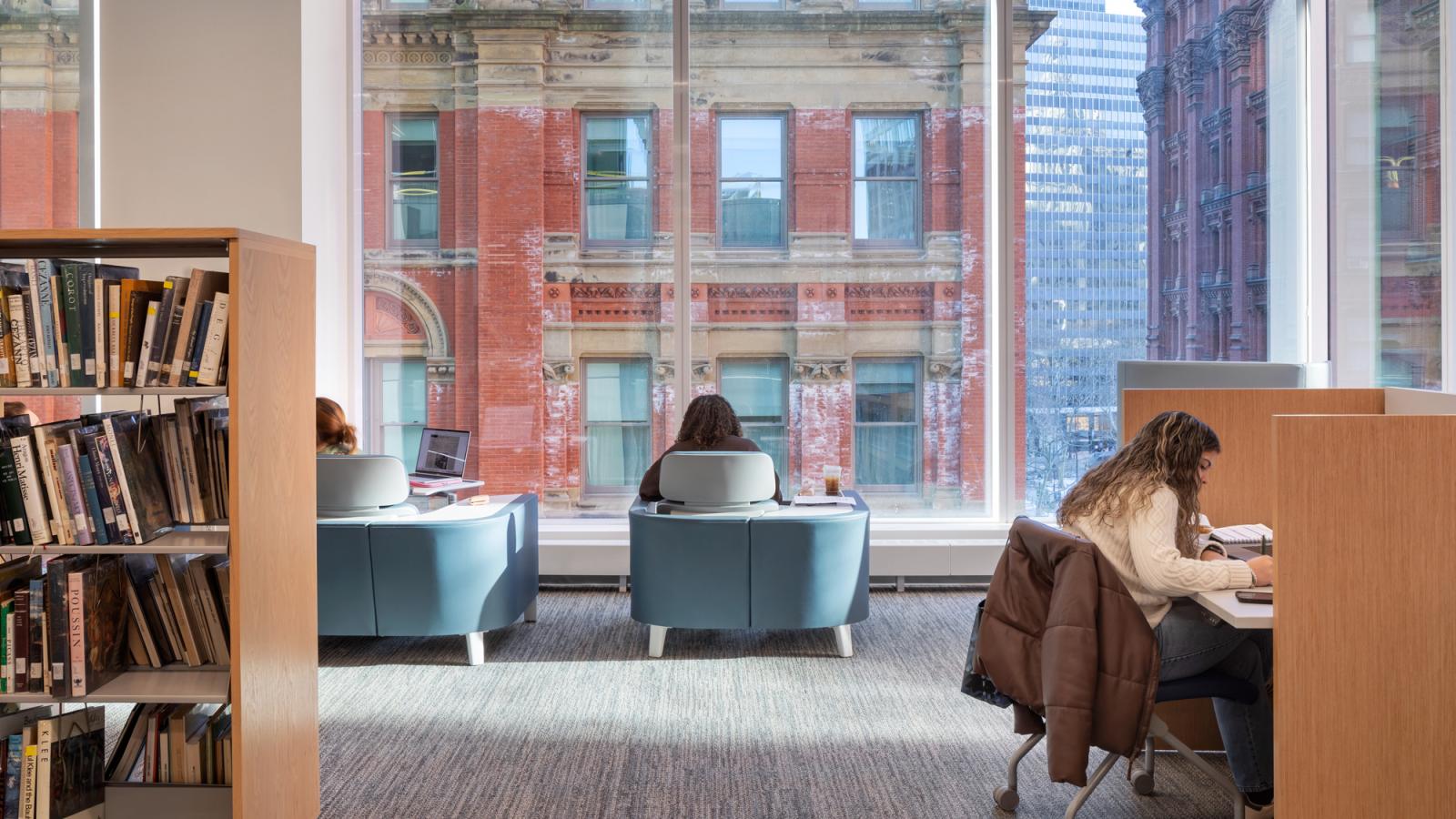 Students working in Pace University's Beekman Library.